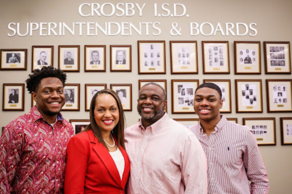 Superintendent Paula Patterson and her husband and two sons