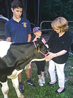 Pam Vogel works with eight governing boards as a superintendent in Connecticut’s rural northwestern corner, where she spends time with students involved in Future Farmers of America.