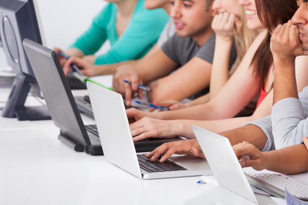 Students with different types of laptops