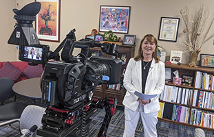 Jill Baker and video camera