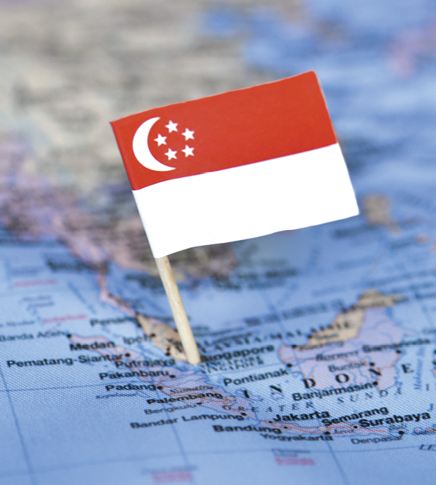 Singapore flag graphic pinned into world map